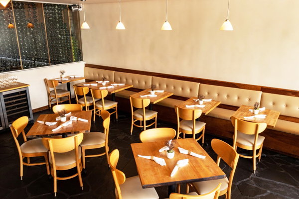 Interior seating area near the wall with leather bench